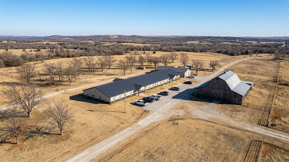 An aerial view of the rural Oklahoma men's addiction treatment campus shows sprawling grounds and secluded buildings.