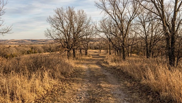 A nature path surrounding the addiction treatment campus grounds in Oklahoma offers a peaceful environment for walks.