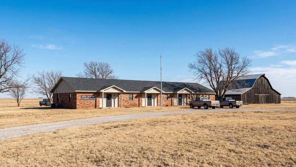 The single-story men's residential addiction treatment facility in rural Oklahoma features modern amenities and a dark roof.