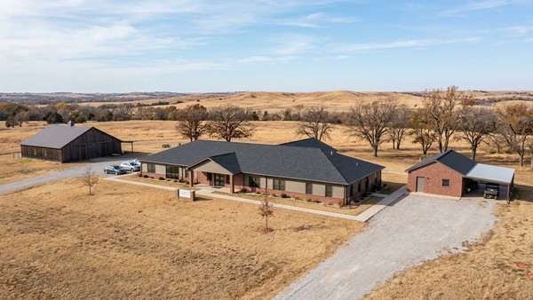 A scenic view of the men's rehab campus and its surrounding nature in rural Oklahoma showcases the peaceful setting.